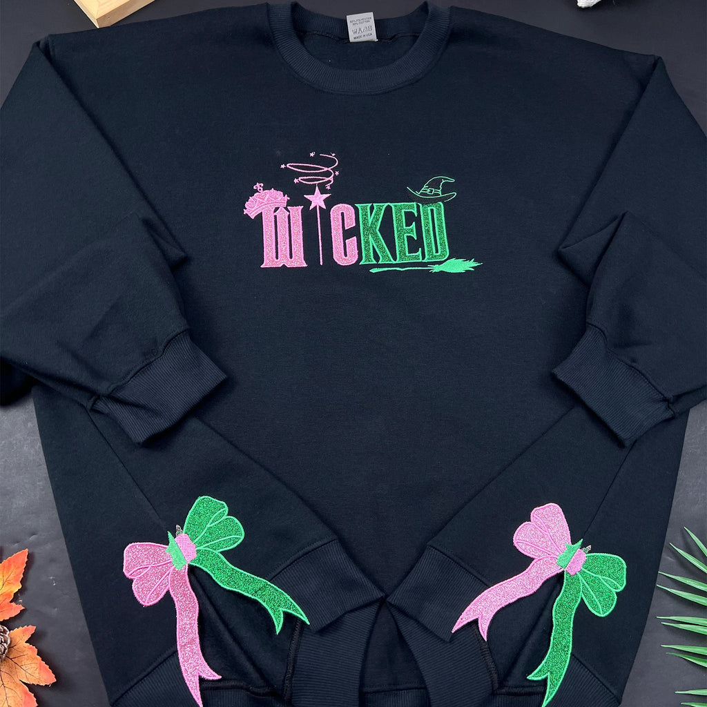Wicked Defy Gravity Embroidered Sweatshirt | Side Bow Glinda & Elphaba Hoodie